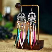 Load image into Gallery viewer, Fashion Retro Hollow Long Feather Earrings European And American