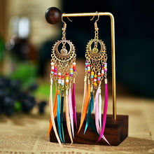 Load image into Gallery viewer, Fashion Retro Hollow Long Feather Earrings European And American
