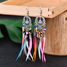 Load image into Gallery viewer, Fashion Retro Hollow Long Feather Earrings European And American