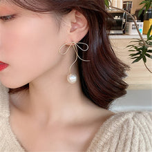 Load image into Gallery viewer, Super Fairy Hollow Metal Bow Pearl Earring Fashion Creative Retro