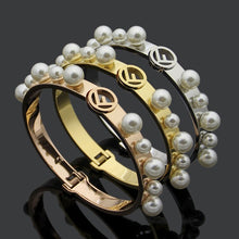 Load image into Gallery viewer, Titanium steel jewelry hollow F letter size pearl spring open Bracelet